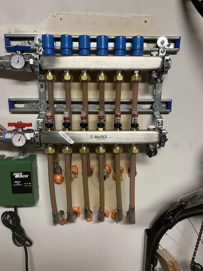 Plumber performing Gas Line Installation at a residential property in Gilford